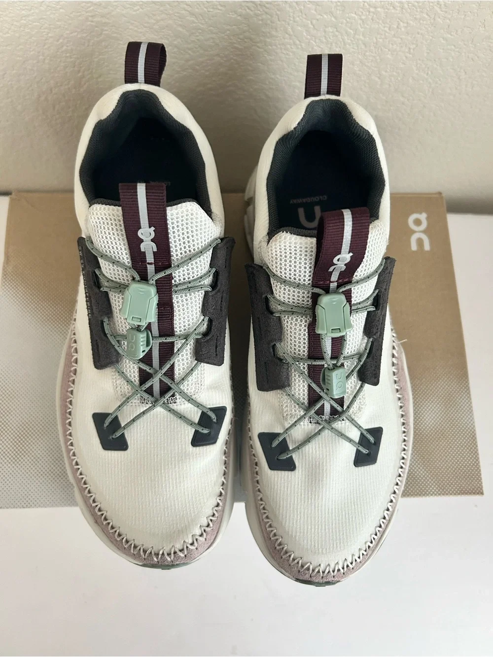 On Running women’s cloudaway Lace-Up Sneakers in White and Light Pink